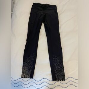 Black Lululemon leggings, scalloped reflective bottom, size 2